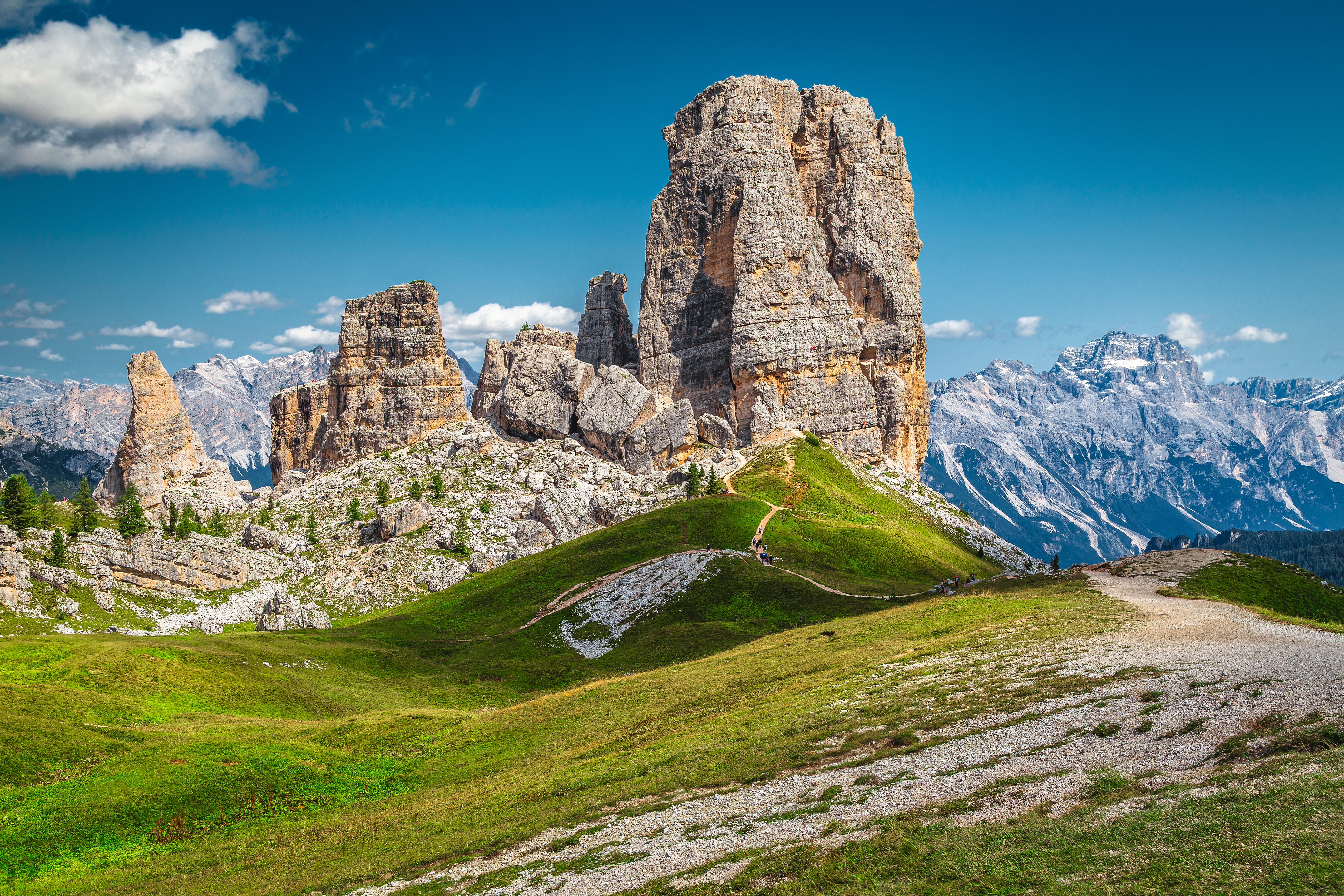 Hiking trail and limestone towers at Cinque Torri in the Dolomites, Italy.
