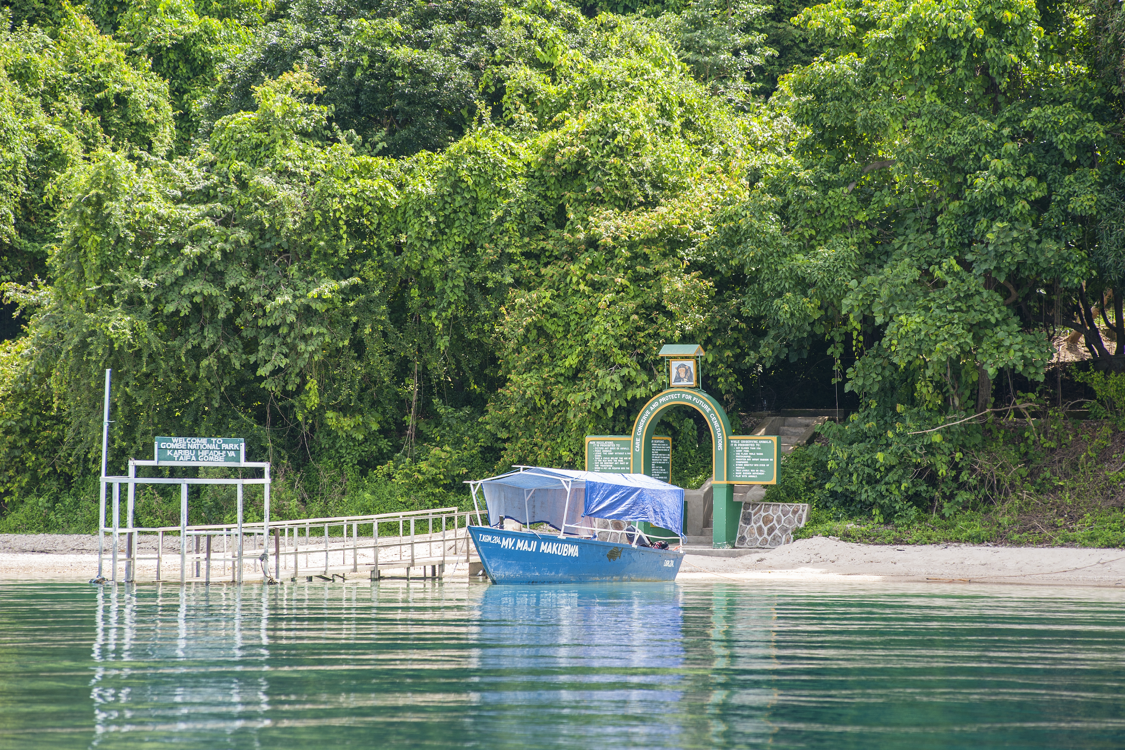 Boat moored at the Gombe Stream National Park entrance on the shoreline of Lake Tanganyika, Tanzania.