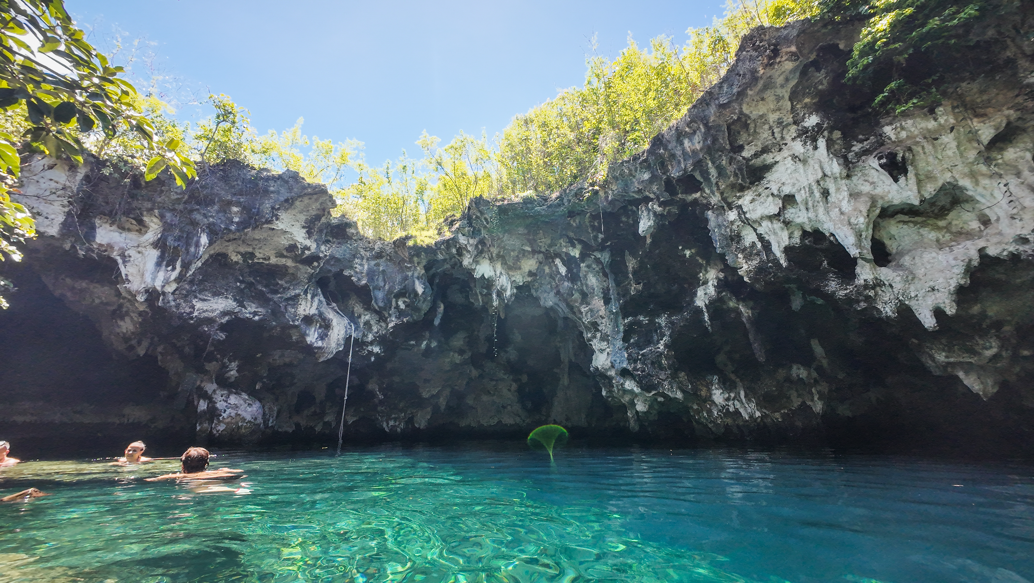 Crystal-clear freshwater lagoon inside Maalum Cave in Paje, Zanzibar, Tanzania.