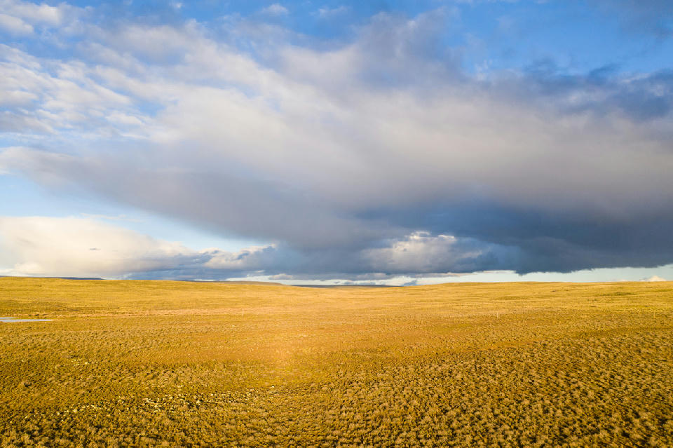 Dramatic storm clouds above the open plains of the Great Karoo in South Africa.