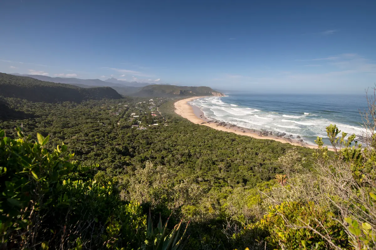 Panoramic view of Nature's Valley beach, coastal forest and Indian Ocean on the Garden Route in South Africa.