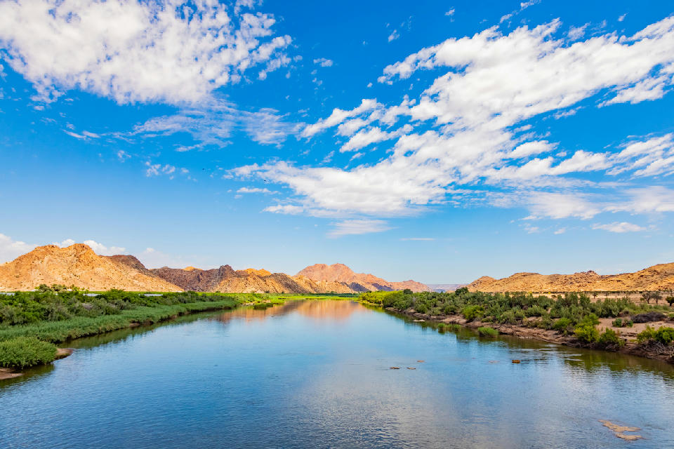 Orange River flowing between rocky canyon walls in Augrabies National Park, Northern Cape, South Africa.