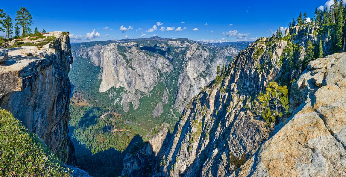 Cliff edge view from Taft Point looking across Yosemite Valley to El Capitan