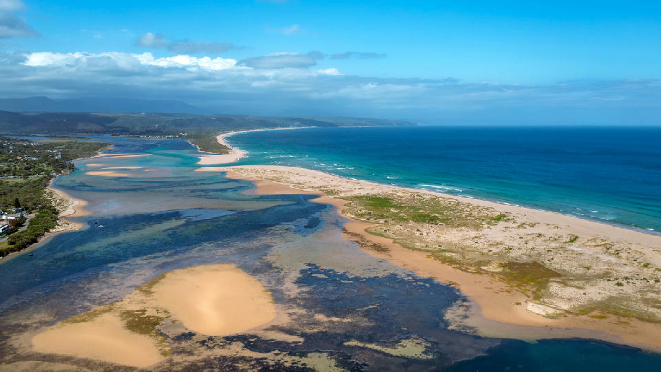 Aerial view of the Keurbooms River Mouth showing estuary channels, sandbanks and the Indian Ocean near Plettenberg Bay.