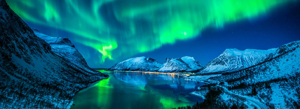 Aurora borealis over a Norwegian fjord
