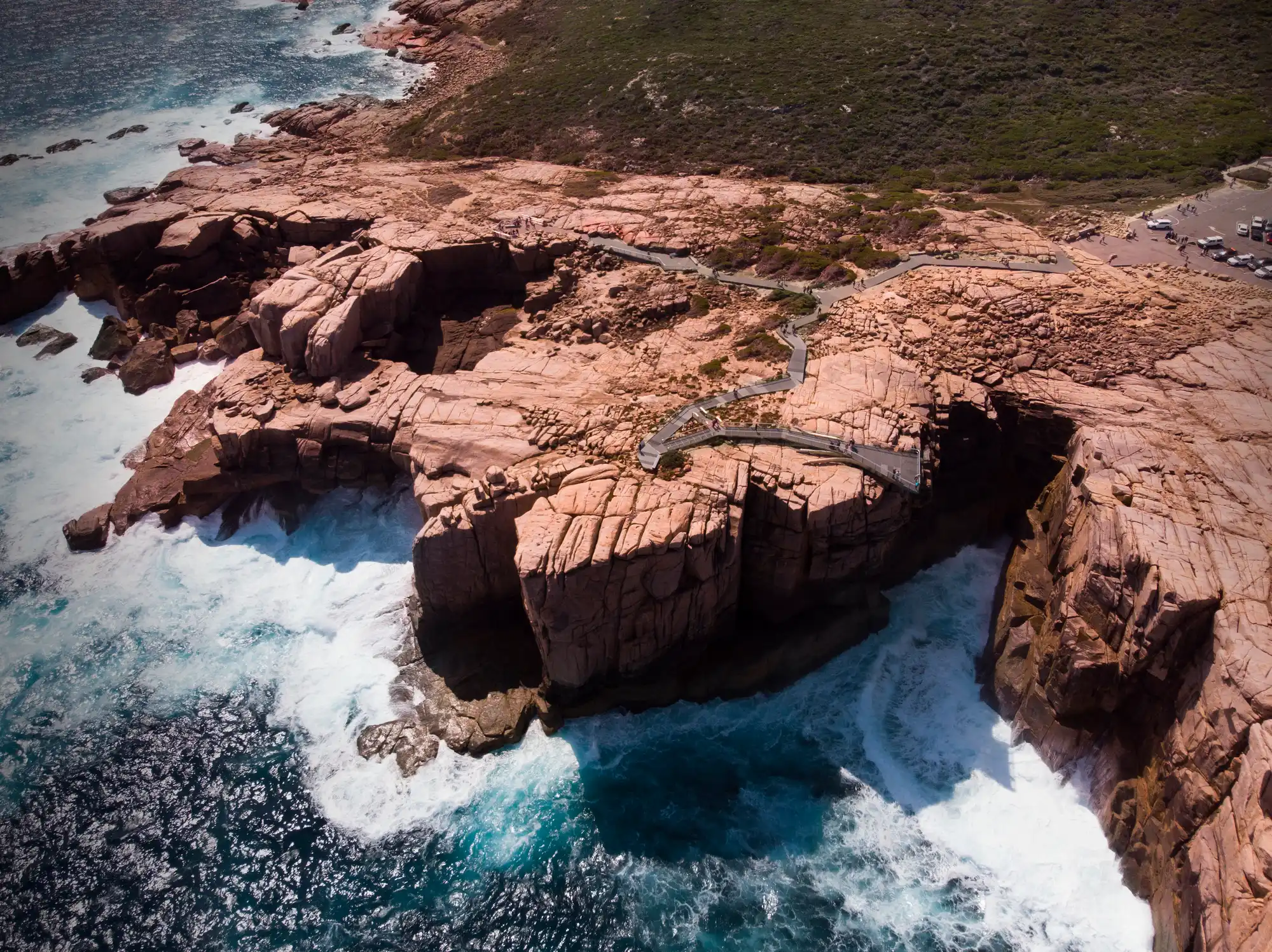 Aerial view of The Gap, cantilevered lookout, walking paths and rugged granite coastline in Torndirrup National Park near Albany, Western Australia.