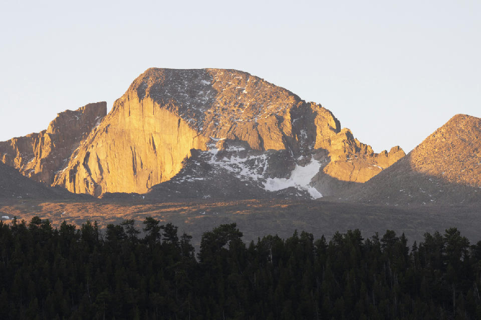 Sunrise light on Longs Peak above Moraine Park in Rocky Mountain National Park, Colorado.
