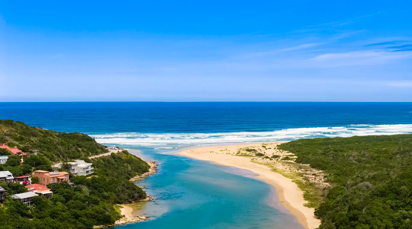 Aerial view of the Swartvlei Mouth where the Swartvlei Estuary meets the Indian Ocean near Sedgefield on the Garden Route.