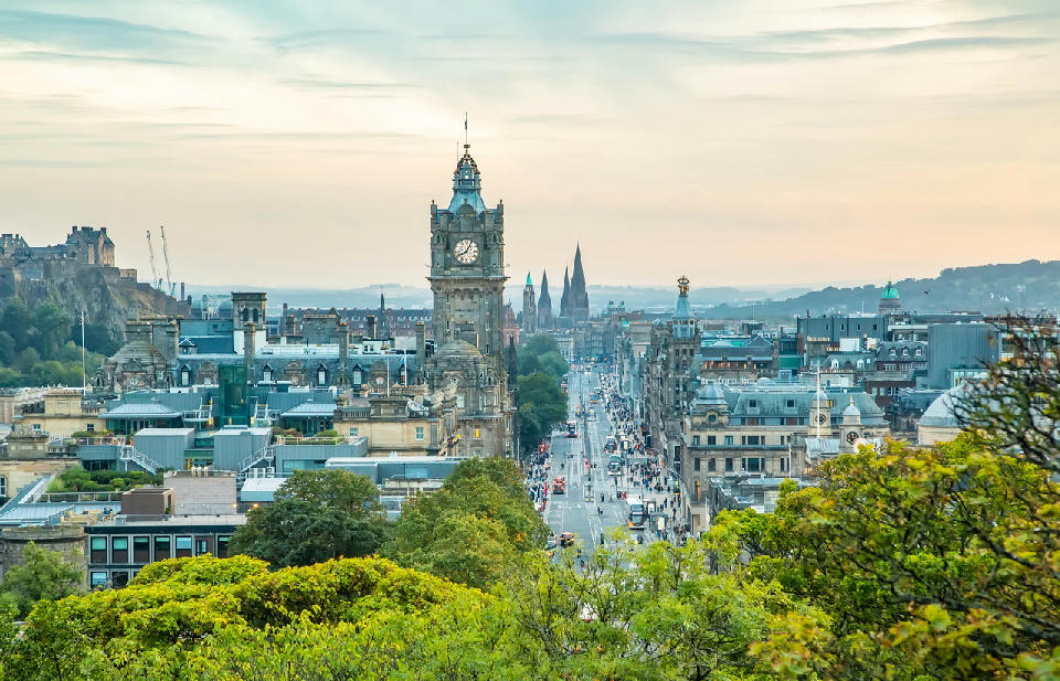 Scenic view of the Edinburgh skyline and Princes Street, with historic buildings and urban landscape in central Scotland.