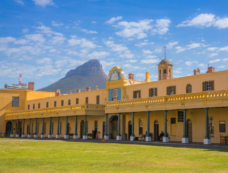Castle of Good Hope historic bastion fort with Lion’s Head rising behind it in Cape Town, South Africa.
