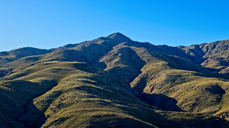 Saptoukop peak and rolling mountain ridges in the Kouga Mountains, Eastern Cape, South Africa.