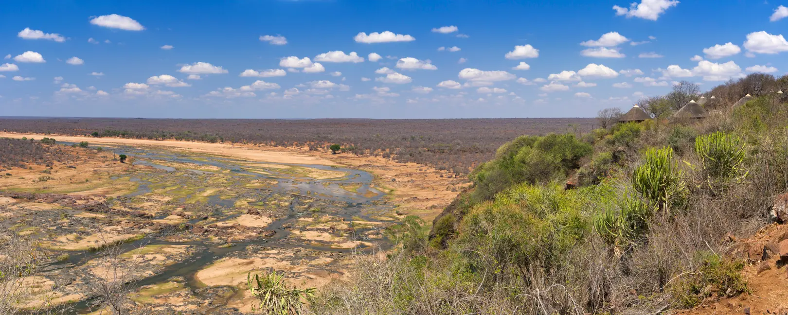 Elevated view of the Letaba River winding through a wide rocky riverbed below Letaba Rest Camp in Kruger National Park.