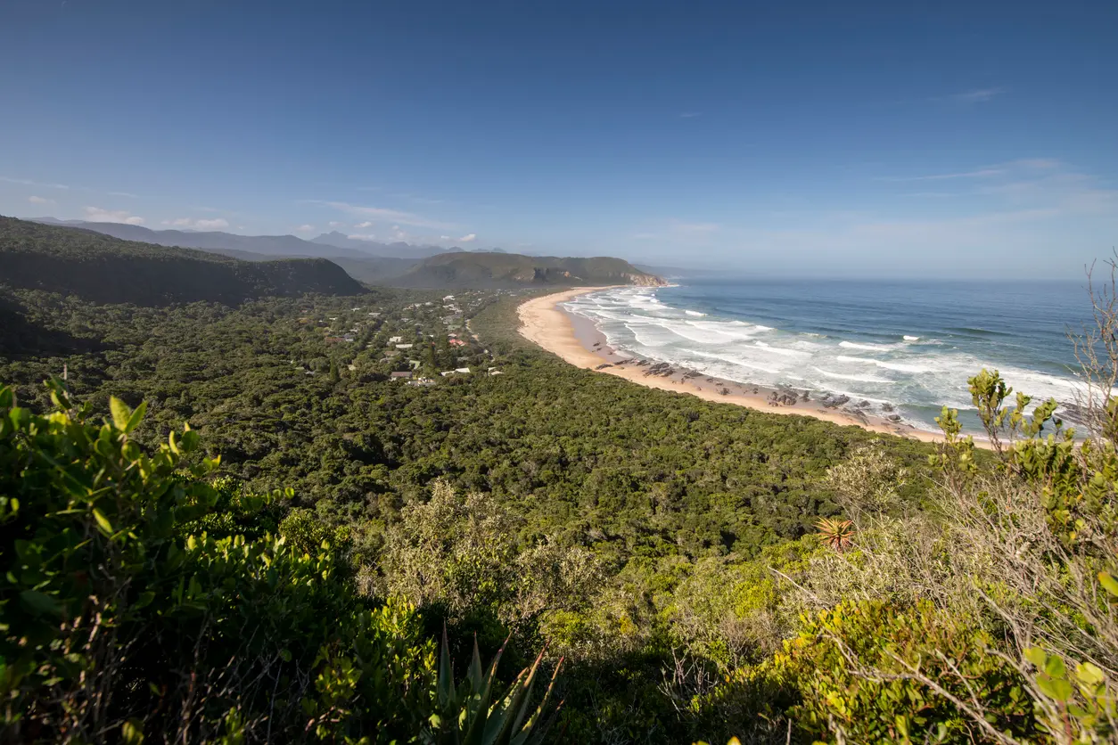Panoramic view of Nature's Valley beach, coastal forest and Indian Ocean on the Garden Route in South Africa.