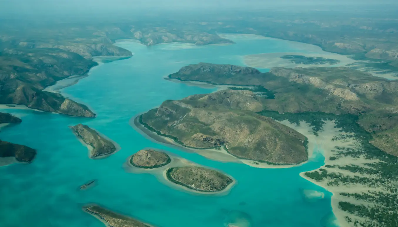 Aerial view across turquoise tidal channels, rugged islands and sandbanks surrounding Horizontal Falls in the Buccaneer Archipelago, West Kimberley.