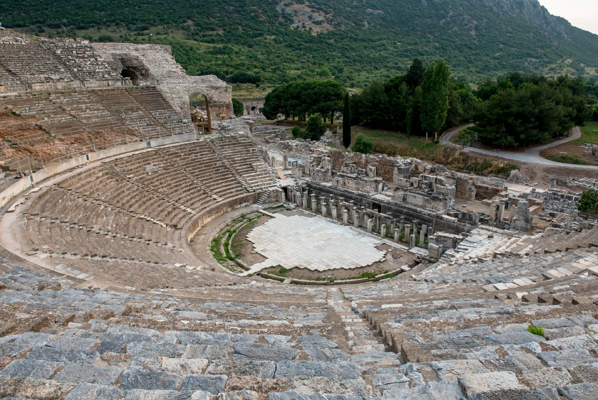 Ancient Great Theatre of Ephesus with tiered stone seating and the remains of its Roman stage complex, Turkey.