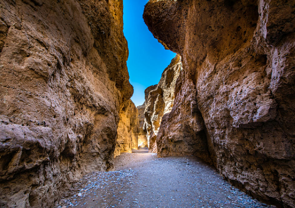 Towering rock walls inside Sesriem Canyon in Namib-Naukluft National Park, Namibia.