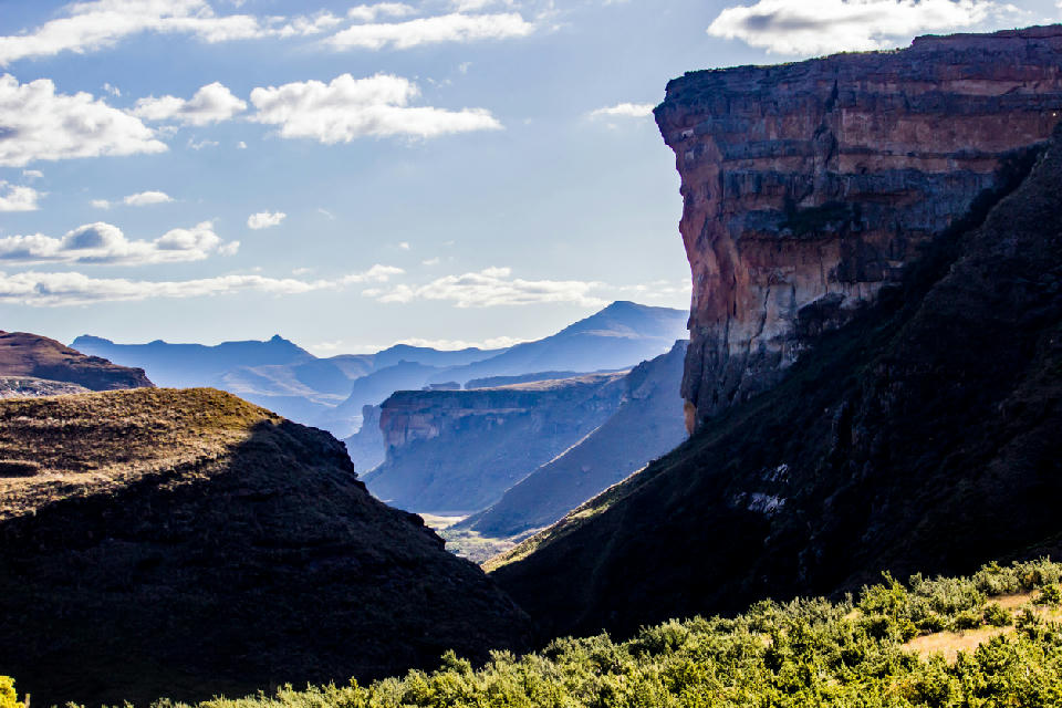 Side view of Brandwag Buttress overlooking a deep valley in Golden Gate Highlands National Park, Free State, South Africa.