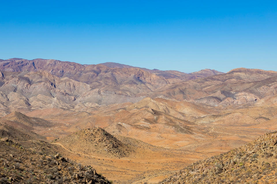 Panoramic view across the rugged desert mountains and valleys of Richtersveld National Park, Northern Cape, South Africa.