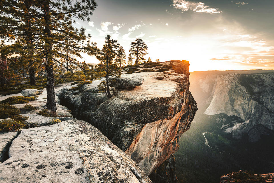 Taft Point rock overhang at sunset above Yosemite Valley in Yosemite National Park, California.