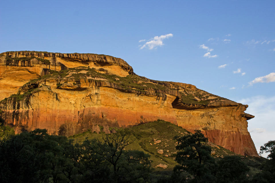 Mushroom Rock glowing in late afternoon sunlight in Golden Gate Highlands National Park near Clarens, Free State, South Africa.
