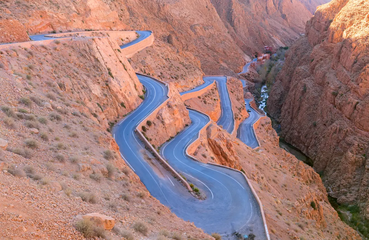 Hairpin bends of Dades Gorge Road winding through the canyon landscape of the High Atlas Mountains in Morocco