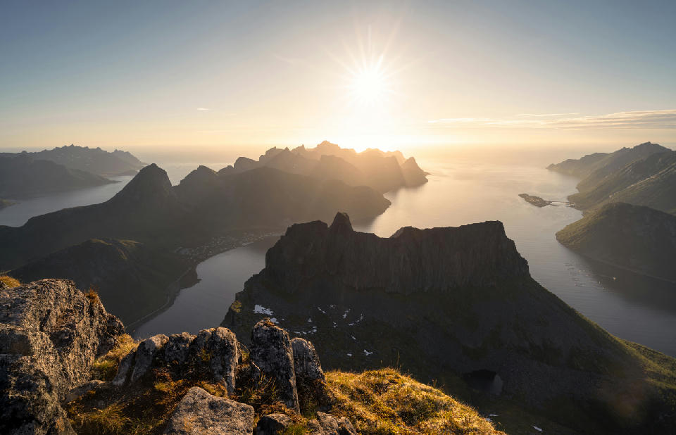 Grytetippen Senja Norway midnight sun mountain ridge view over fjords and coastal peaks