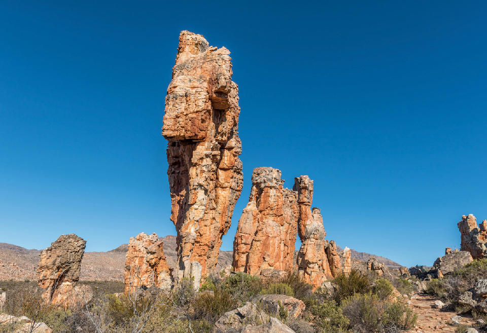 The towering Lots Wife sandstone rock formation along the hiking trail near Dwarsrivier in the Cederberg Mountains, South Africa.
