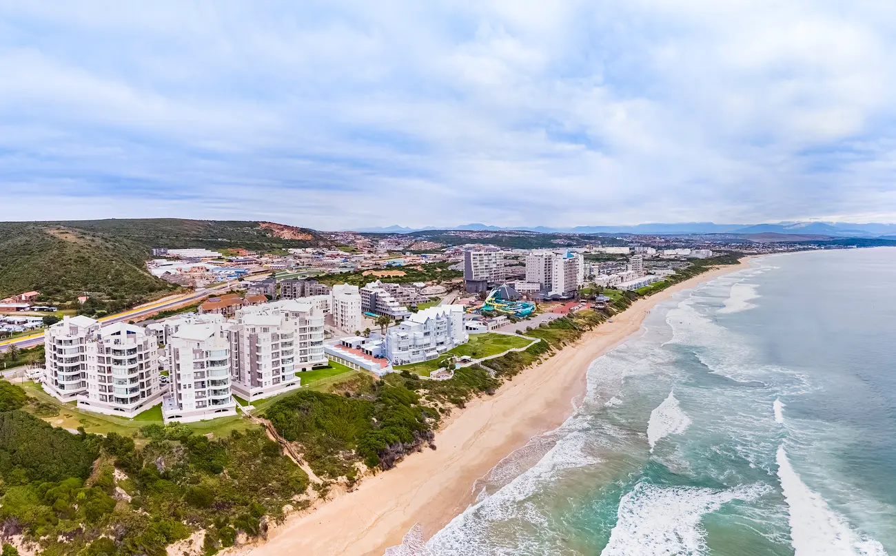 Aerial view of Diaz Beach and beachfront apartments along the coastline west of Mossel Bay on the Garden Route, South Africa.