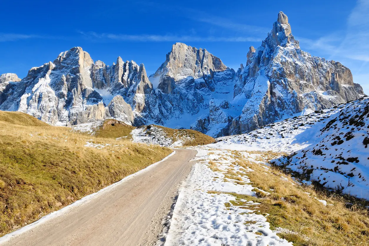 country road in Italian Alps - Passo Rolle - Pale di San Martino mountain in Trentino Region, on autumn 2011, Italy, Europe