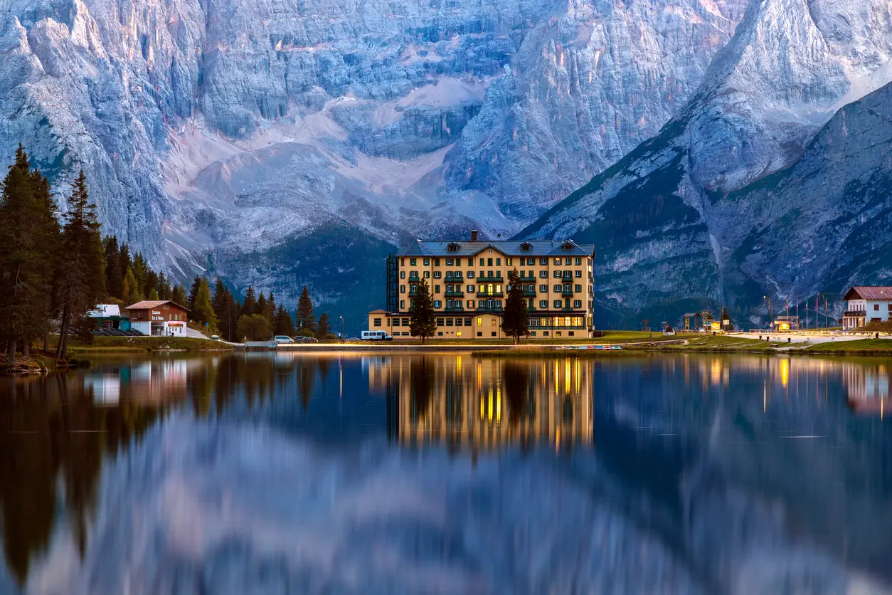 Mountains reflected in Lago di Misurina, set within the Dolomites in northern Italy.