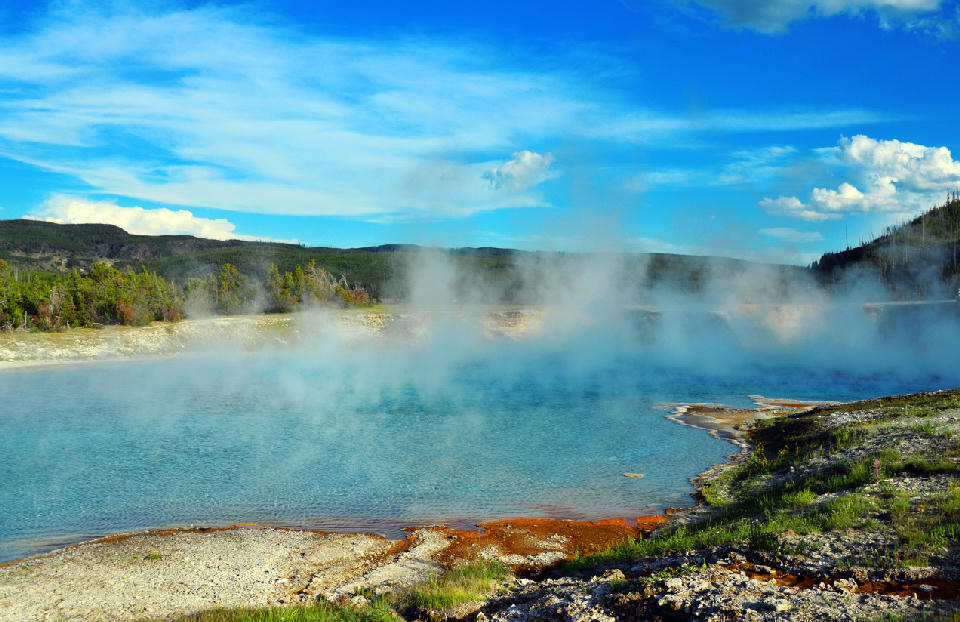 Excelsior Geyser Crater Yellowstone Midway Geyser Basin steaming blue pool Firehole River runoff