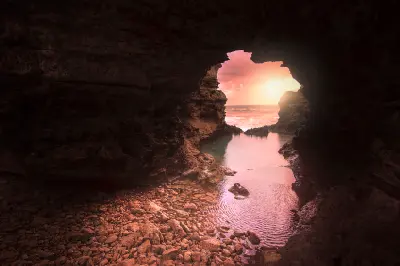 Sunset illuminating the rock pool and limestone opening at The Grotto, Victoria.