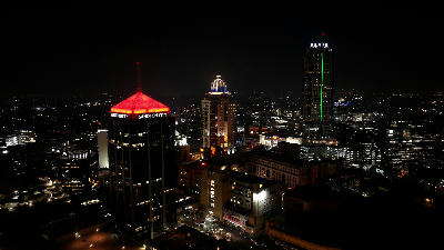 Night view of the Sandton skyline in Johannesburg, featuring Sandton City, the Michelangelo tower and The Leonardo illuminated above the city lights.
