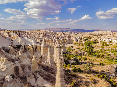 Love Valley with distinctive geological rock formations in the Cappadocia region of Turkey.