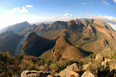 Three Rondavels rock formations overlooking the Blyde River Canyon and winding river below in Mpumalanga, South Africa.