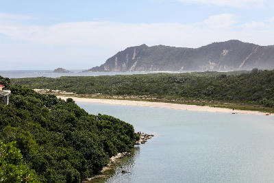 View across the Swartvlei Mouth towards the fossilised dune cliffs of Gericke's Point near Sedgefield on the Garden Route.