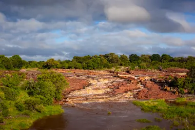 Red Rocks rapids and red sandstone formations on the Shingwedzi River near Shingwedzi Rest Camp in Kruger National Park.