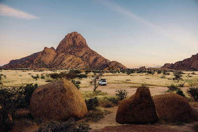 Spitzkoppe rises dramatically above the surrounding desert plains, creating one of Namibia’s most iconic mountain landscapes and wild camping destinations.