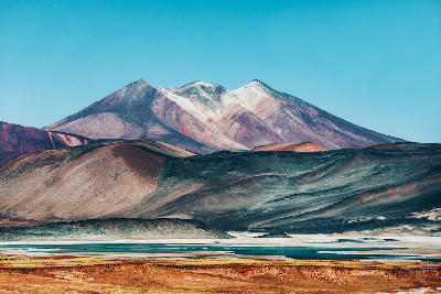 Laguna Tuyajto with volcanic mountains in the Atacama Desert Chile.