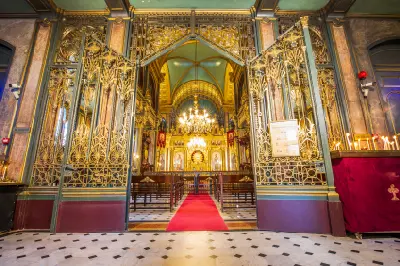 Ornate interior and gilded iconostasis of the Bulgarian St. Stephen Iron Church in Balat, Istanbul.