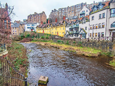 Dean Village buildings and the Water of Leith river in Edinburgh.