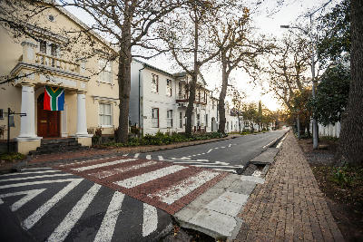 Oak-lined Dorp Street with historic Cape Dutch buildings in Stellenbosch town centre, Cape Winelands, Western Cape, South Africa.