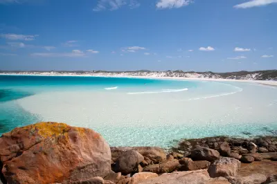 Turquoise water, white-sand beach, coastal dunes and granite rocks in Cape Le Grand National Park near Esperance, Western Australia.