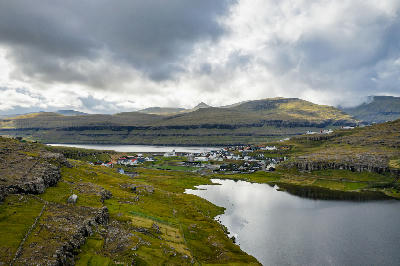Overhead view of Eiði village beside Eiðisvatn lake on Streymoy, Faroe Islands.
