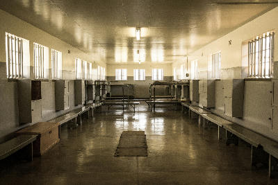 Interior of prison dormitory at Robben Island Museum near Cape Town, South Africa.