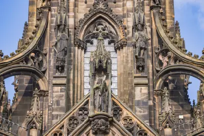 Detailed Gothic carvings and statues on the Scott Monument in Princes Street Gardens, Edinburgh.