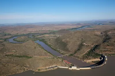 Aerial view of Gariep Dam with the Orange River flowing downstream through the Karoo landscape of the Free State and Eastern Cape.