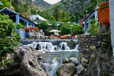 Waterfall and riverside cafés at Ras El Maa in Chefchaouen, Morocco