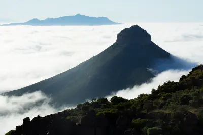 Cloud inversion surrounding a mesa-shaped mountain in the Valley of Desolation landscape near Graaff-Reinet in the Eastern Cape Karoo, South Africa.