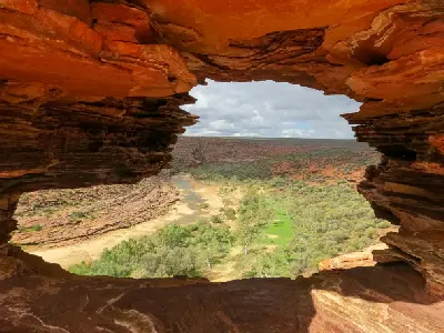 Murchison River and gorge landscape framed by the red sandstone opening of Nature’s Window.